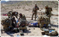Medics treat casualties during a mission in Northern Kandahar.jpg
